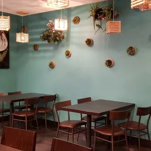 Seating with restrooms down the hall to the left