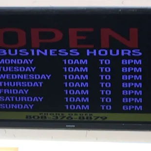an open business hours sign