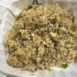 Thai fried rice with pork.   We had the chili peppers in a separate container.