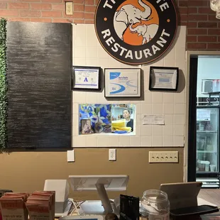 a table with a laptop and other items