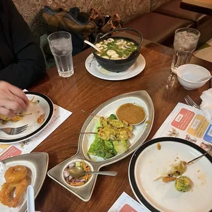 Chicken thigh skewers with a bomb ass peanut dip sauce