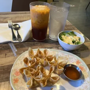 Crab ragoons, tea, and salad that goes to my lunch special...