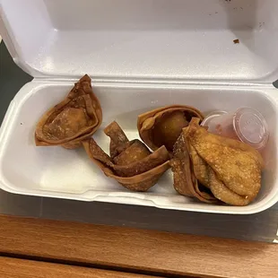 A5.Crab Rangoon was too hard to bite into and when we broke one open, the filling was dry