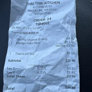 a receipt on a car seat