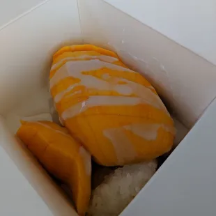 Best mango and sticky rice I've ever had that wasn't made by family .