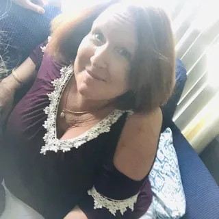 Joy E.