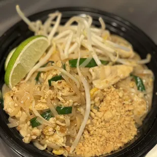 a bowl of noodles and vegetables