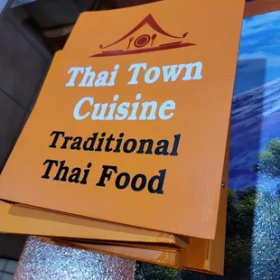 Menu is a binder. They got a lot of choices.