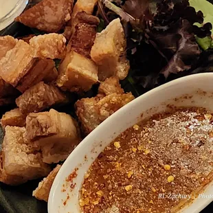 Fried pork belly, the sauce had some spice.