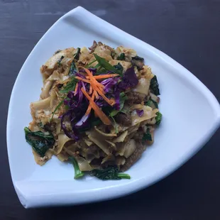 Pad See Ew  -Sautéed Flat noodles with Chinese broccoli, and egg in sweet brown sauce.