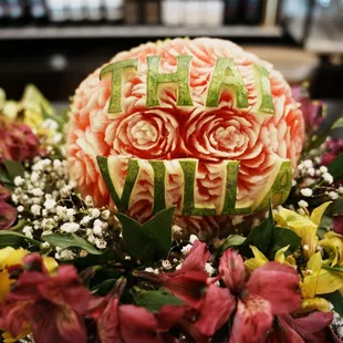 a watermelon carved into flowers