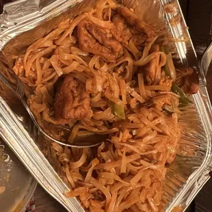 chicken and noodles in a foil container