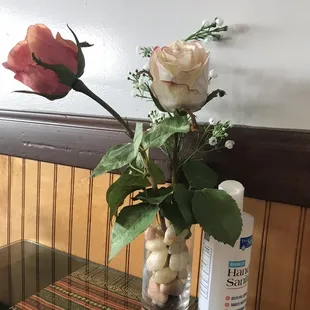 Real roses and hand sanitizer