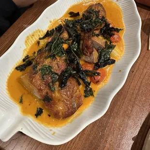 Roasted duck curry.  My 13 y/o son said it was very good!