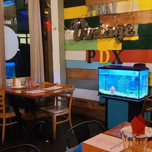 a dining room with a television