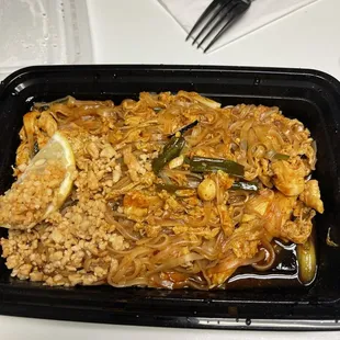 a meal in a black container