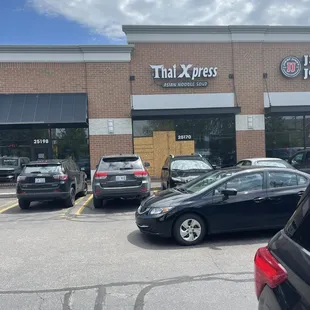cars parked in front of the store