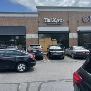 cars parked in front of the store