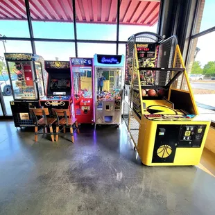 Cash operated arcade machines in the dining area.