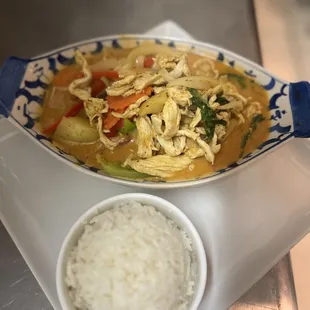 Yelloew Curry...Creamy coconut soup, potatoes, protein of choice, carrots, tomatoes, red bell, green bell, yellow onion...