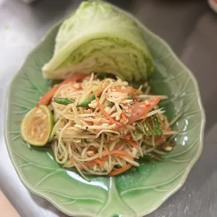 Papaya Salad, Young Papaya, fesh lime, garlic cloves, shredded carrots, fresh green beans, tomatoes, fish sauce...