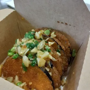Battered Chinese Eggplants, Deep Fried, &amp; Finished with Our Signature Garlic Sauce &amp; Green Onions