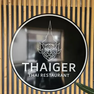 the entrance to a thai restaurant