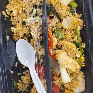 a plate of rice and vegetables