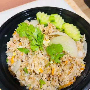  a bowl of rice and vegetables