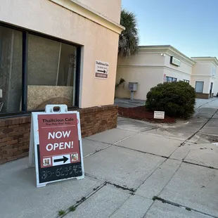 Signs in plaza leading the way