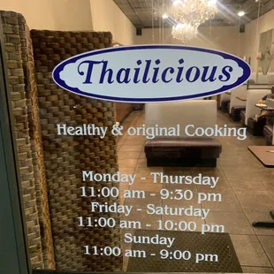 a sign in the window of a restaurant