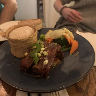 Short Rib - Perfect, fall-off-the-bone tender with an amazing sweet sauce paired with fluffy sticky rice. Highly recommend.