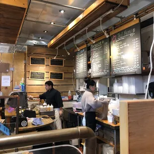 two men working in a restaurant