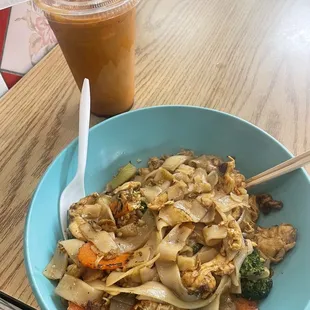 Pad See Ew Noodles with chicken and Thai iced tea