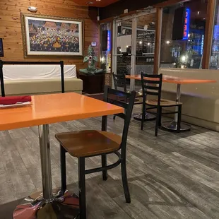 tables and chairs in a restaurant