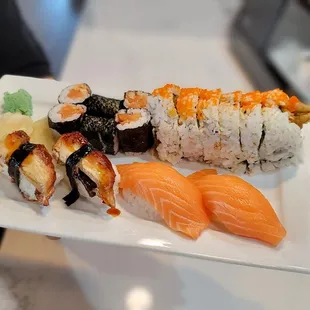 Spicy salmon roll; unagi nigiri; salmon nigiri; Black Widow Roll