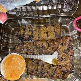 Beef Satay with peanut sauce.