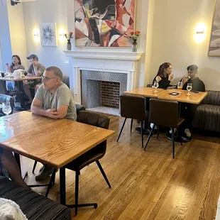 a group of people sitting around a table