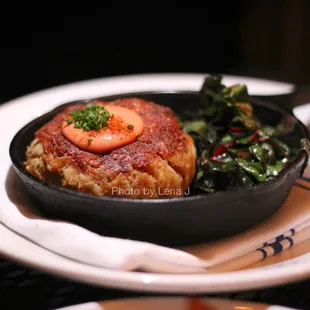 Cast Iron Crab Cake ($36) - East Coast blue crab deluxe, local Swiss chard, roasted sweet potato, eastern shore cocktail sauce