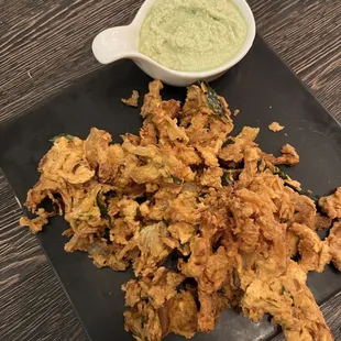 Onion Pakora $9 not too oily. Good coconut dip. Would get again