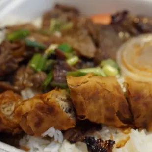 a close up of a meal in a styrofoam container