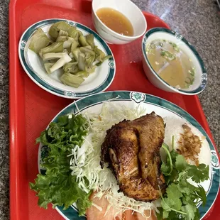 a plate of food on a tray