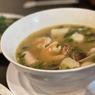 a bowl of soup on a plate