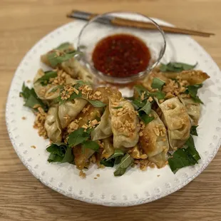 Frozen gyoza and I cooked with rau ram and fried garlic