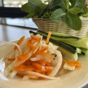 a plate of vegetables on a table