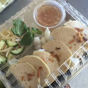 a plastic container filled with food