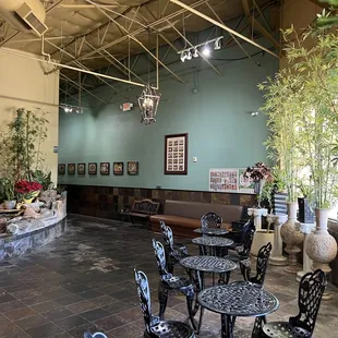 a restaurant with tables and chairs