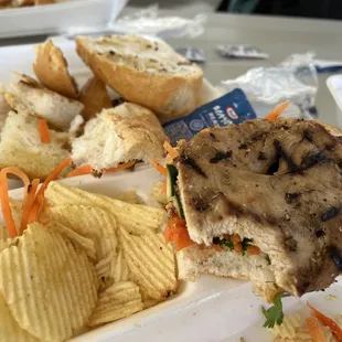 Dry, flat chicken in the Bahn mi.  Bread was super stale - you can see we did not eat the bread. This was a very bad sandwich.