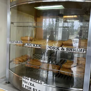a display case full of doughnuts