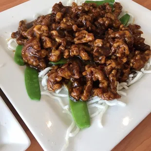 a plate of stir fried food